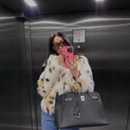 Ladies short jacket made from luxurious faux fur with spotted fur look and straight silhouette Fashion Glam