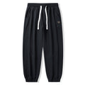 Men's Loose Fit Jogging Pants with Drawstring, Elastic Waistband and Sewn Knee Areas Fashion Glam