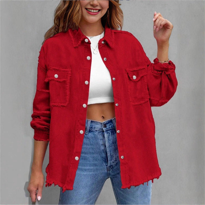Women's oversized denim shirt jacket with fringe trim, flap pockets, and snap front Fashion Glam