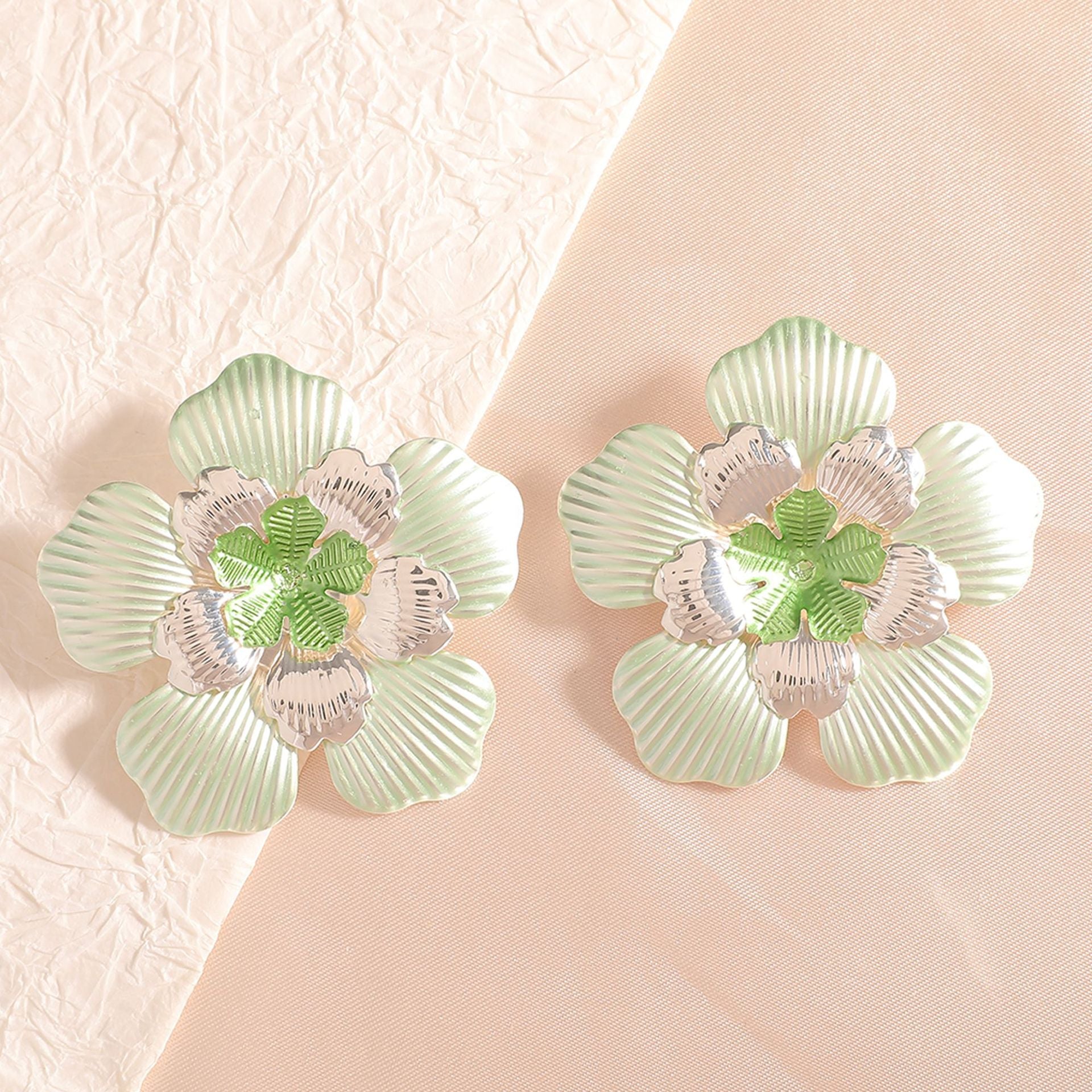 Ladies' flower earrings with intricate design and glossy accents Fashion Glam