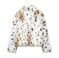 Ladies short jacket made from luxurious faux fur with spotted fur look and straight silhouette Fashion Glam