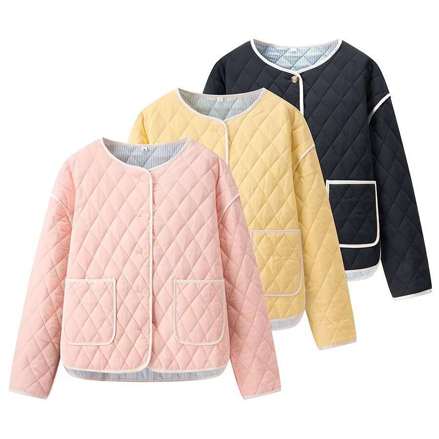 Women's short-cut quilted transitional jacket with round neck, decorative piping, and turn-up cuffs Fashion Glam