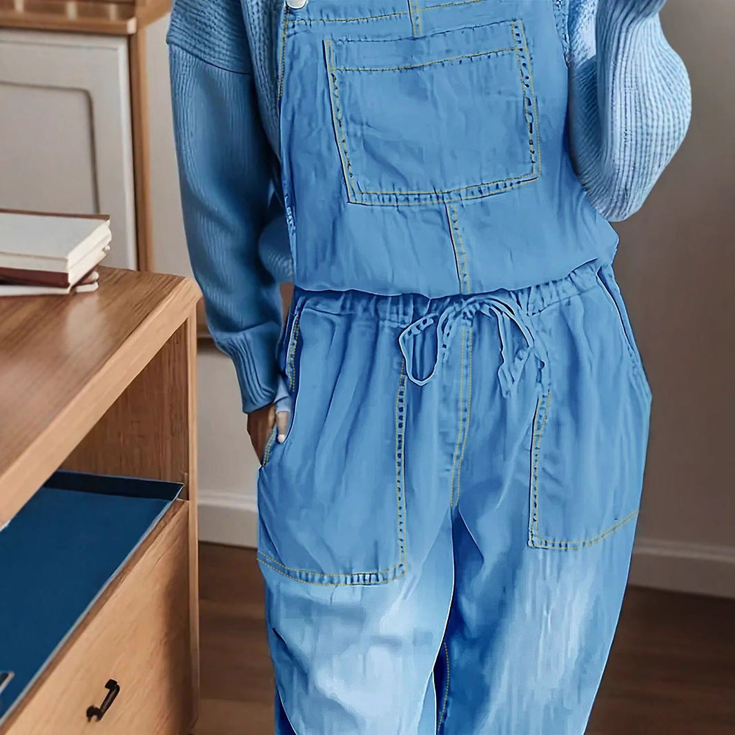 Women's overall jumpsuit made of lightweight denim with a drawstring waistband, patch pockets, and turned-up hem Fashion Glam