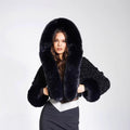 Women's short bolero made of bouclé faux fur with voluminous hood and fur cuffs Fashion Glam
