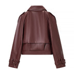 Ladies short cut biker jacket made of faux leather with asymmetrical front and waist belt Fashion Glam