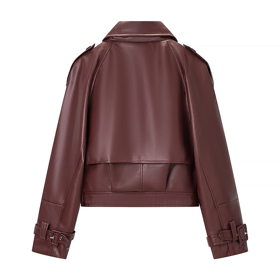 Ladies short cut biker jacket made of faux leather with asymmetrical front and waist belt Fashion Glam