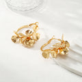 Ladies Creoles with artistic floral ornament Fashion Glam