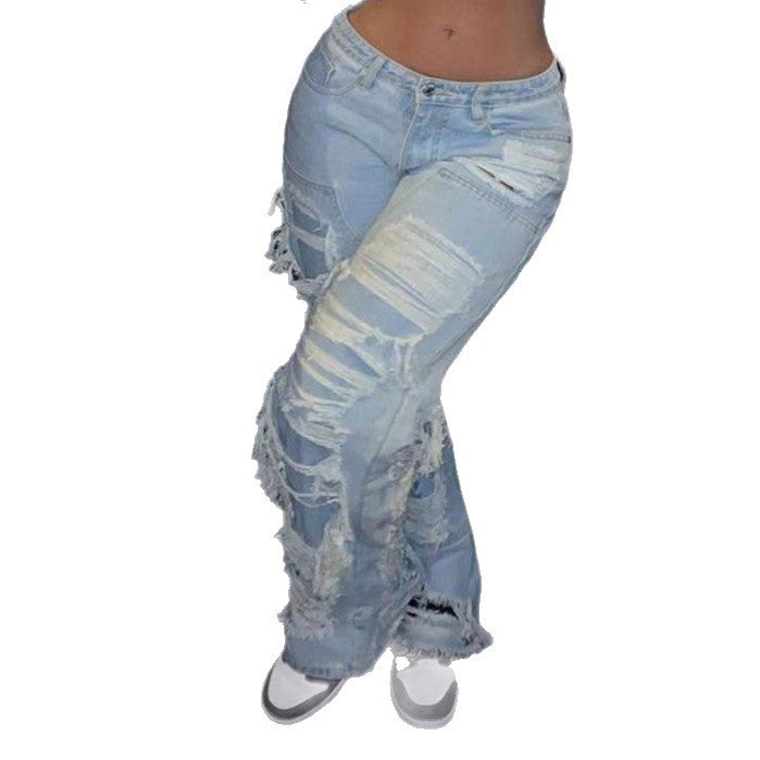 Women Baggy Denim Pants with Extra Large Destroyed Cutouts and Wide Leg Fashion Glam