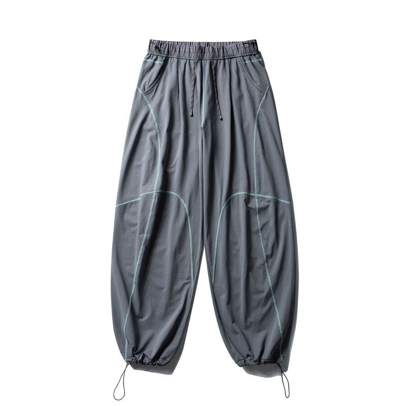 Unisex locker cut tech jogging pants with elastic waistband, distinctive flatlock seams and drawstring Fashion Glam