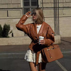 Women short jacket in velour look with shawl collar, belt at waist and decorative lacing Fashion Glam