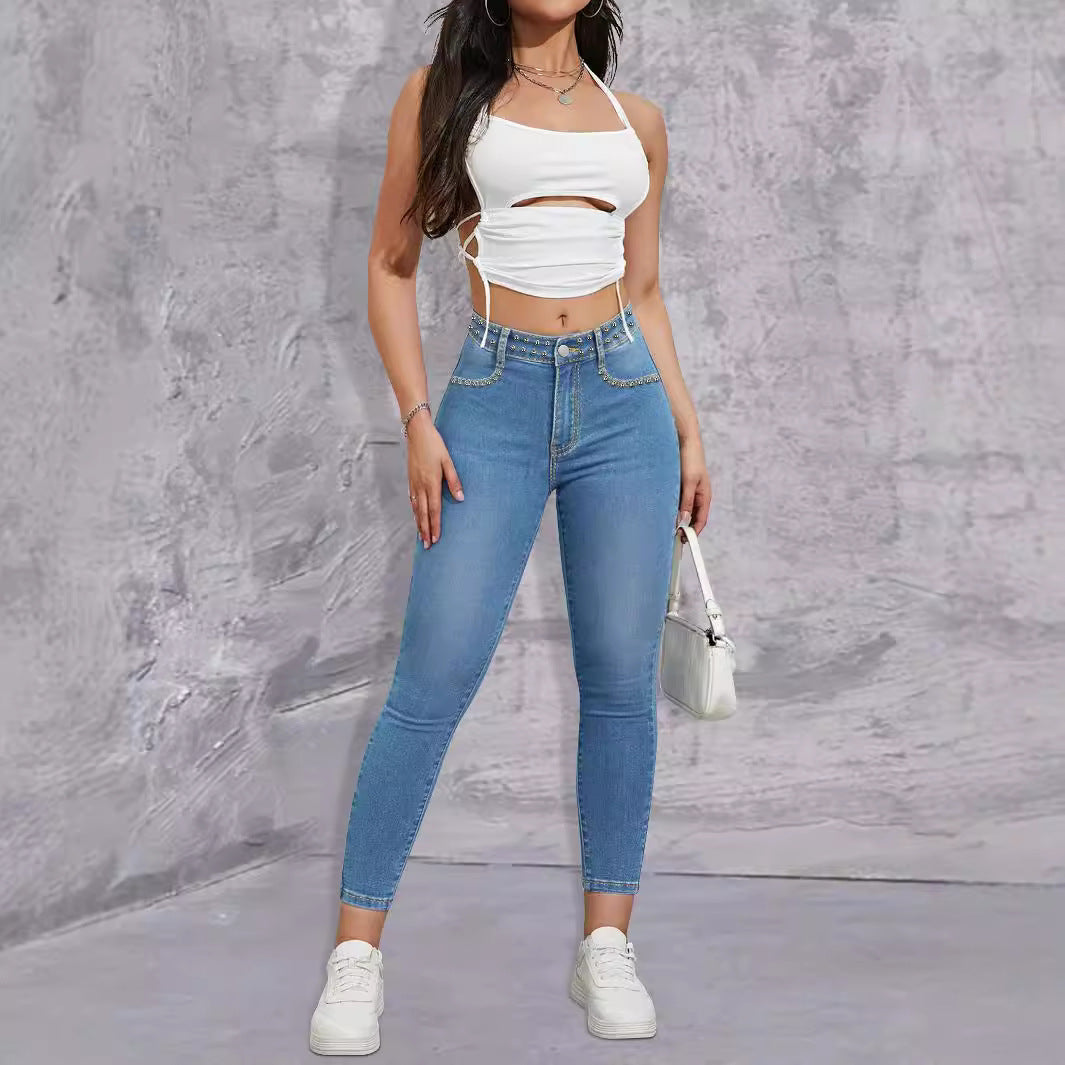Ladies high-waisted skinny jeans with rhinestone embellishments and ankle-length cut Fashion Glam