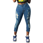 Women's high-cut ankle-length skinny jeans with generous rip details and raw hem Fashion Glam