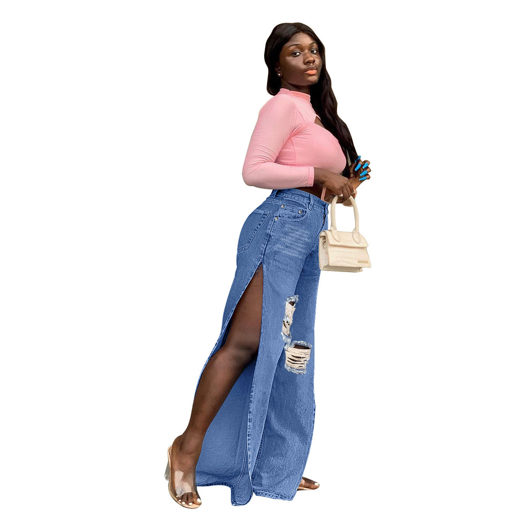 Ladies tapered denim jeans with high side slits and destroyed knee area Fashion Glam