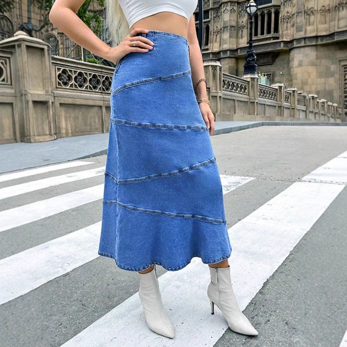 Women's waist-accentuating denim midi skirt with wave-shaped decorative seams and flared hem Fashion Glam