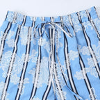 Women's wide palazzo pants with elastic drawstring waistband and floral lace look Fashion Glam