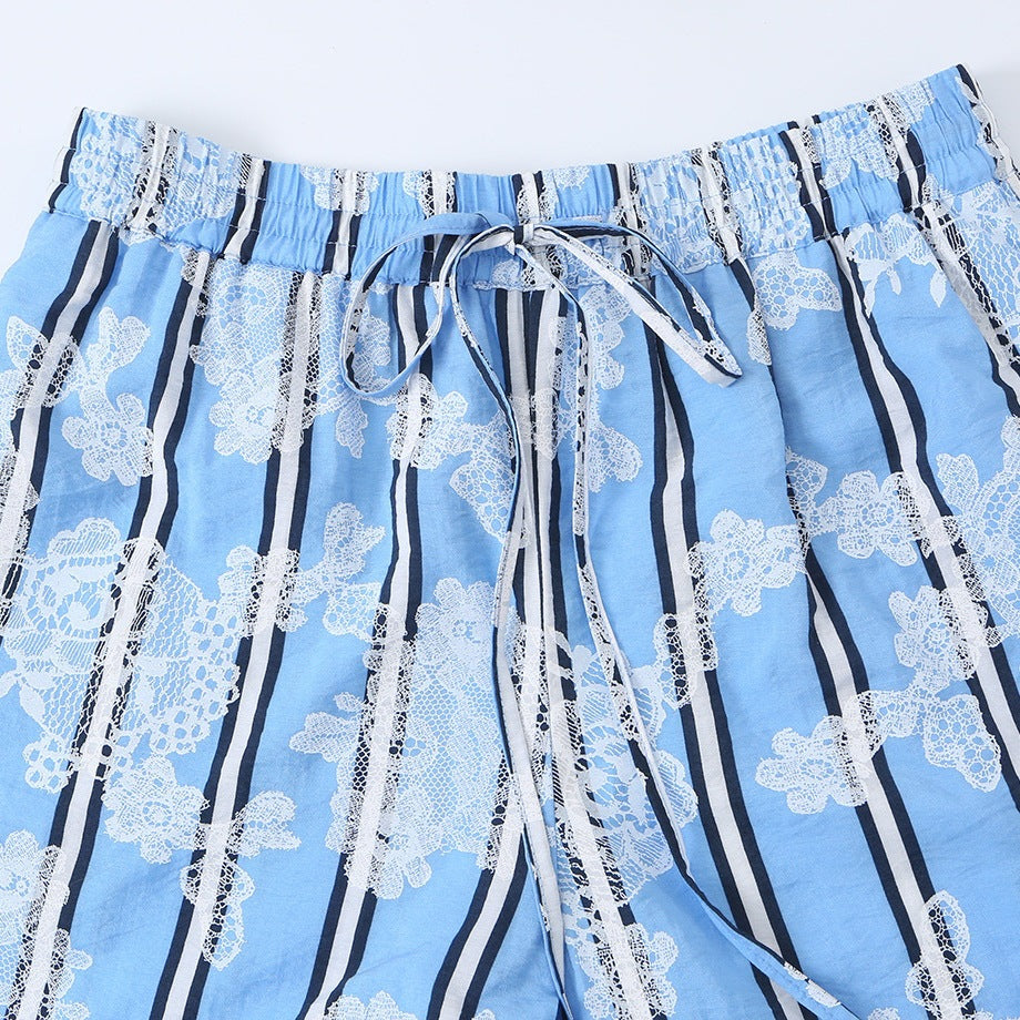 Women's wide palazzo pants with elastic drawstring waistband and floral lace look Fashion Glam