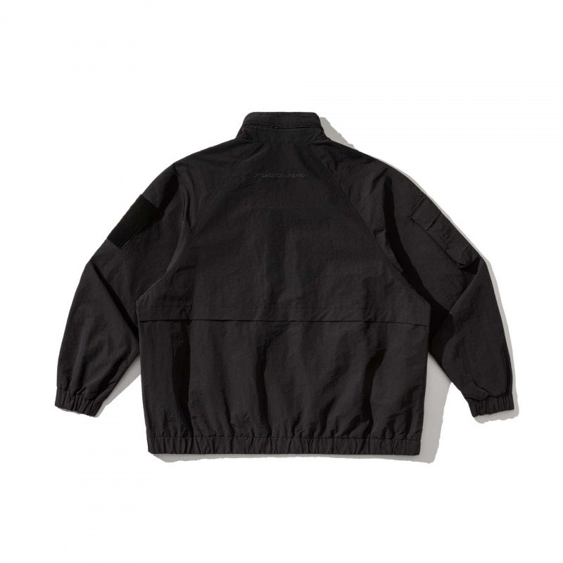 Unisex Oversize Utility Jacket with multifunctional pockets, high stand-up collar, and elastic hem Fashion Glam