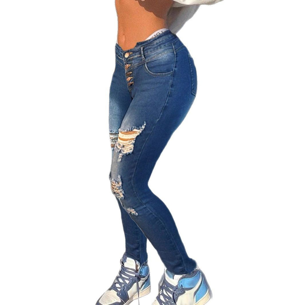 Ladies shaping high-waist skinny jeans with asymmetric rips and fringe patch Fashion Glam