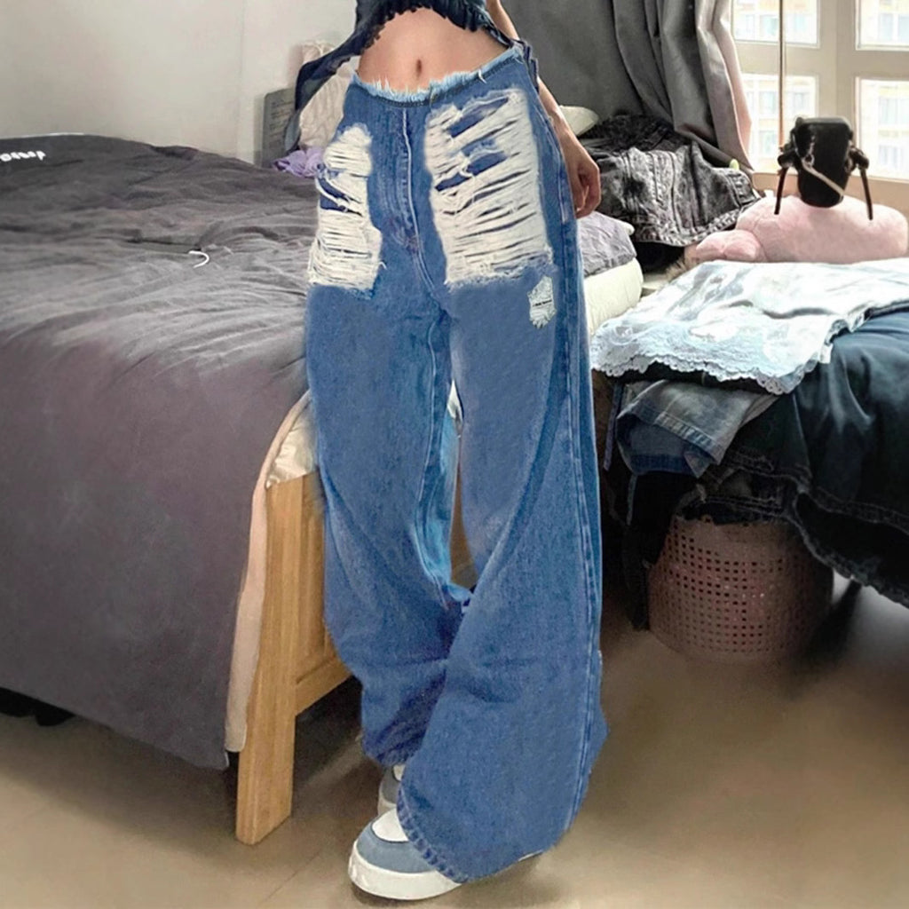 Women's high-cut wide denim jeans with heavily distressed front and raw waistband Fashion Glam
