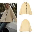 Women's cape coat with stand-up collar, asymmetric button placket and decorative seam Fashion Glam