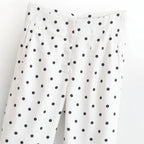 Women's high-waisted tapered fabric pants with polka dot print and elegant waistband processing Fashion Glam