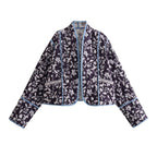 Women's quilted short jacket in kimono style with floral quilted look and contrasting piping Fashion Glam
