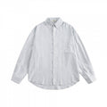 Unisex Oversize striped shirt with chest pocket and rounded hem Fashion Glam
