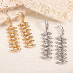 Ladies Hanging Earrings in Modern Spiral Design Fashion Glam