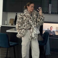 Women's short jacket made of synthetic fur in Dalmatian look with boxy silhouette and wide shawl collar Fashion Glam