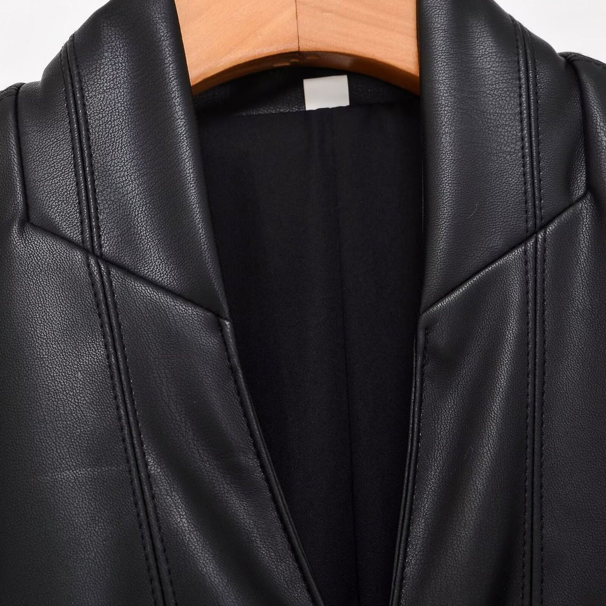 Women's tailored double-breasted faux leather midi coat with shawl collar and patch pockets Fashion Glam