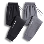 Men's Sporty Jogging Pants with Zipper Pocket, Drawstring, and Elastic Cuffs Fashion Glam