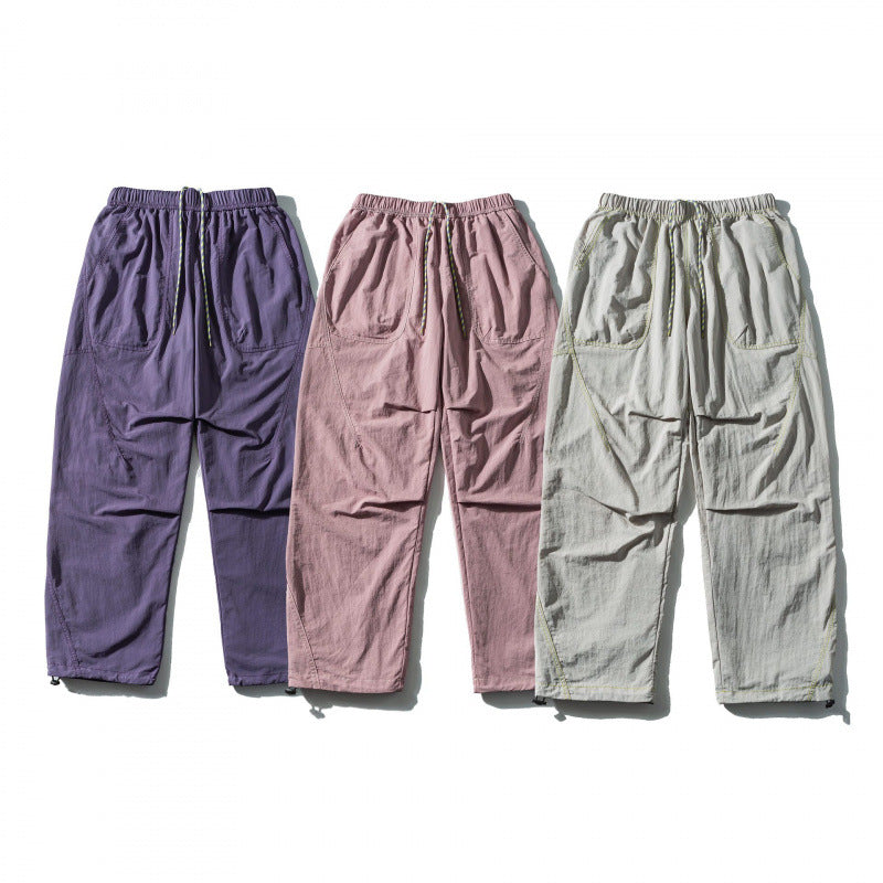 Unisex Loose-fitting outdoor pants with elastic waistband, drawstring, and adjustable leg cuffs Fashion Glam