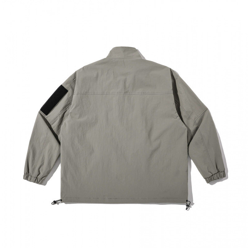Unisex Lightweight Technical-Utility Jacket with Stand Collar, Zipper Pockets and Drawstring Hem Fashion Glam