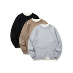 Unisex fine knit sweater with raglan seam and triangular hem adornment Fashion Glam