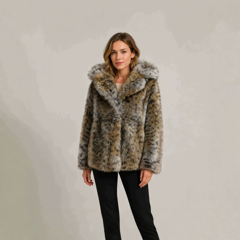 Women's short jacket made of high-quality faux fur with a hood and concealing boxy silhouette Fashion Glam