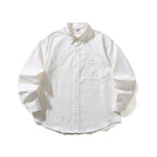Unisex Oversized shirt with button-down collar, chest pocket and rounded hem Fashion Glam