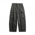 Men's cargo pants in baggy cut with drawstring and large flap pockets Fashion Glam