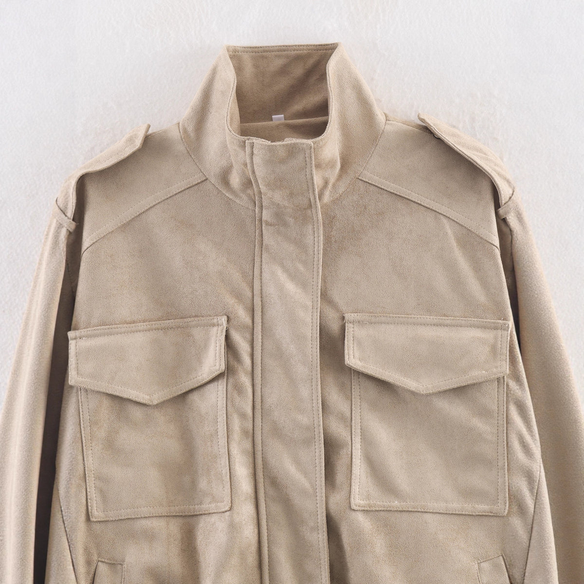 Women’s short jacket in military style with epaulets, patch chest pockets, and elastic hem Fashion Glam