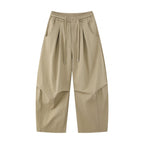 Unisex wide layered pants with balloon-shaped silhouette, high waist and drawstring Fashion Glam