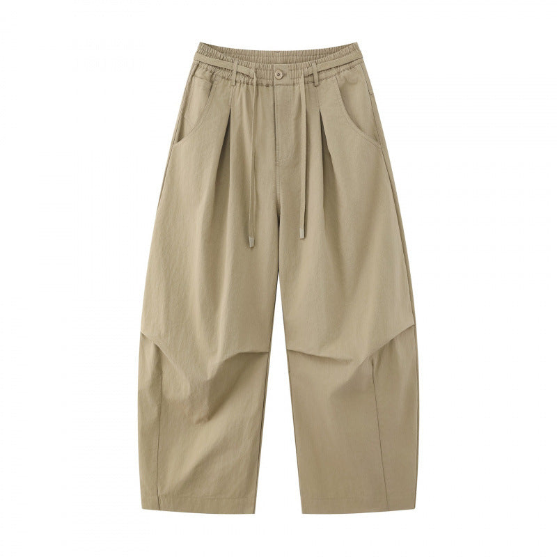 Unisex wide layered pants with balloon-shaped silhouette, high waist and drawstring Fashion Glam