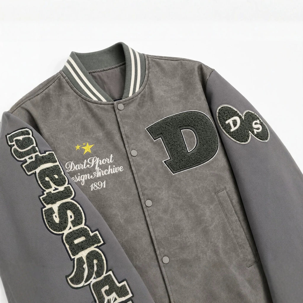 Men's varsity bomber jacket in college style made of faux leather with appliqués Fashion Glam