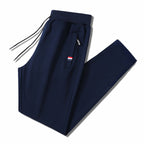 Men's Slim-Fit Jogging Pants with Elastic Ribbed Waistband, Drawstring and Zipper Pockets Fashion Glam