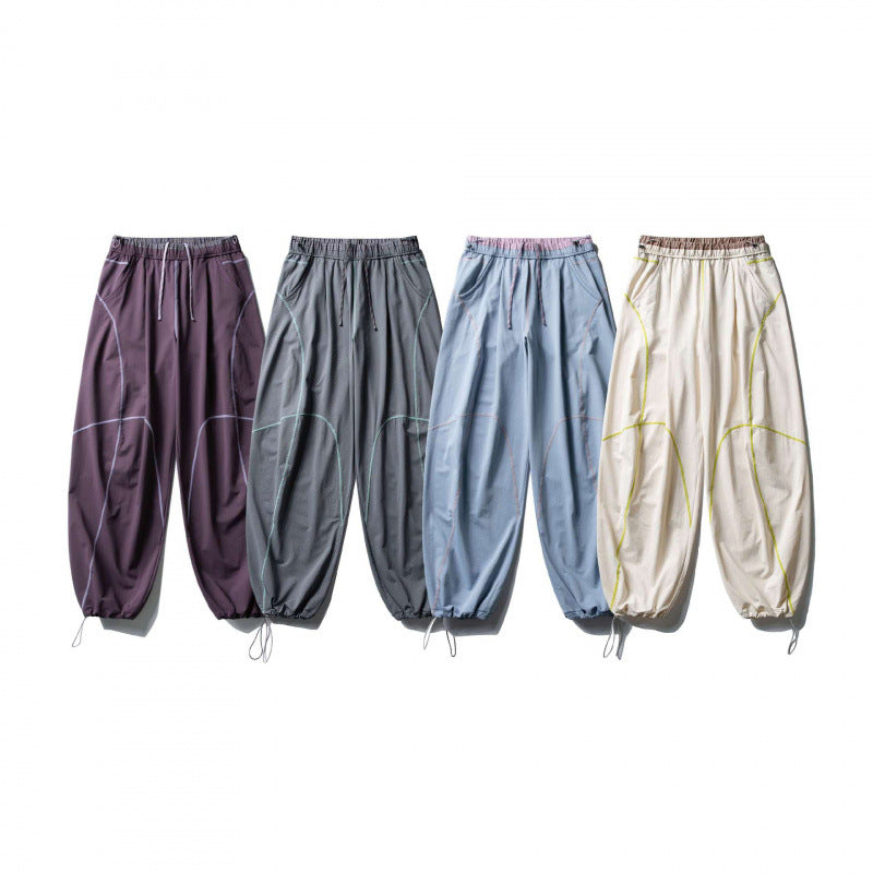 Unisex locker cut tech jogging pants with elastic waistband, distinctive flatlock seams and drawstring Fashion Glam
