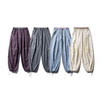 Unisex locker cut tech jogging pants with elastic waistband, distinctive flatlock seams and drawstring Fashion Glam