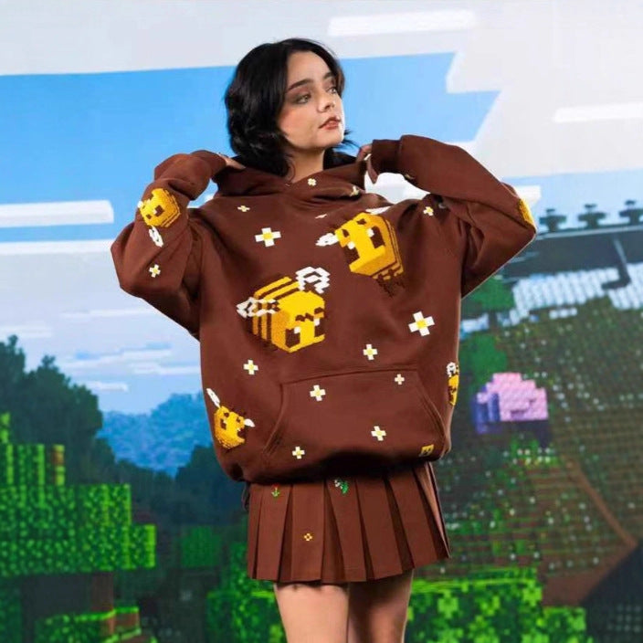 Unisex hoodie with knitted pixel bee design and attached kangaroo pocket Fashion Glam