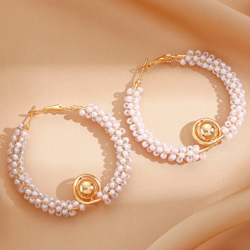 Women’s hoops with artistic pearl design Fashion Glam