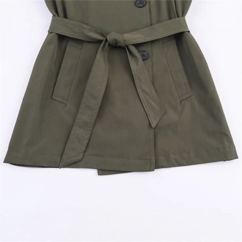 Women's short trench coat with A-line silhouette, double-breasted button placket, detachable belt, and shoulder epaulettes Fashion Glam