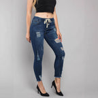 Women High-Waisted Destroyed Jogger Jeans with Elastic Drawstring Waistband and Cropped Frayed Hem Fashion Glam