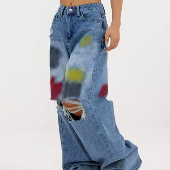Women's wide Denim jeans with paint splatter and distressed knees Fashion Glam