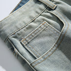 Unisex Relaxed-Fit Vintage-Jeans with high waist and distinctive ripped knee section Fashion Glam